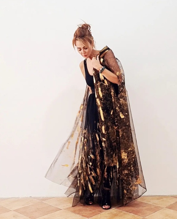 Roula Harb — Black & Gold Sheer Dress, draped sleeve